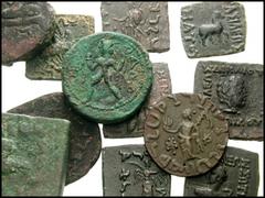 BAKTRIA and related. Lot of twelve Æ. Indo-Greek, Indo-Scythian and Kushan. Most on square flans. Eukratides // Menander (3, including a large 16 unit) // Zoilos // Strato I // Amyntos // Maues // Aze
