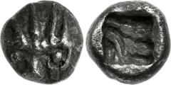 ASIA MINOR, Uncertain. Circa 5th century BC. AR Obol (7mm, 0.62 g). Stylized facing lion’s head wearing four-spiked crown / Incuse square punch with intersecting lines and pellet. Cf. M. Thompson, “So