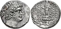 SELEUKID KINGS of SYRIA. Antiochos XII Dionysos. 87/6-83/2 BC. AR Tetradrachm (25mm, 15.77 g, 1h). Damaskos mint. Dated SE 228 (85/4 BC). Diademed head right, with short beard / Cult image of Hadad, h