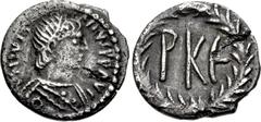 Justinian I. 527-565. AR 125 Nummi (10mm, 0.51 g, 6h). Light group. Ravenna mint. Struck 552-565. Diademed, draped, and cuirassed bust right / Large PKЄ within wreath. DOC 335c-e var. (control mark be