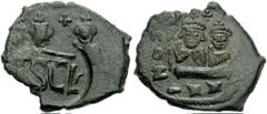 155046. Sold For $95 HERACLIUS. 610-641 AD. Æ Follis (30mm, 9.11 gm, 5h). Sicilian mint. Struck 631 AD. Crowned figures of Heraclius and Heraclius Constantine standing facing; cross in field between; 