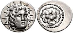 755851. Sold For $795 ISLANDS off CARIA, Rhodos, Rhodes. Circa 40 BC-25 AD. AR Drachm (19mm, 4.08 gm, 12h). Cistophoric standard. Radiate head of Helios facing slightly right / P-O, rose seen from abo