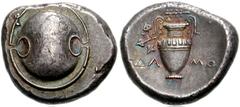 765850. Sold For $1250 BOEOTIA, Thebes. Circa 395-338 BC. AR Stater (22mm, 12.26 g). Damo-, magistrate. Struck circa 390-382 BC. Boeotian shield / Amphora, three ivy leaves and berry hanging from left