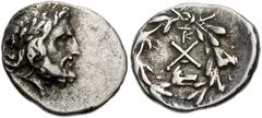 773990. Sold For $195 ACHAIA, Achaian League. Argos. Circa 195-188 BC. AR Hemidrachm (16mm, 2.43 g, 11h). Laureate head of Zeus right / AX monogram; monograms above; below, forepart of wolf right; all
