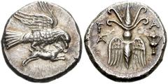 775268. Sold For $1650 ELIS, Olympia. 134th-143rd Olympiad. Circa 244-208 BC. AR Drachm (17mm, 4.86 g, 11h). Eagle flying right, tearing at hare held in its talons / Winged thunderbolt; monogram to le