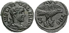 780946. Sold For $195 TROAS, Alexandria Troas. Valerian I. AD 253-260. Æ As (21mm, 5.09 g, 12h). Laureate, draped, and cuirassed bust right, seen from behind / Eagle flying right, holding forepart of 