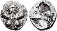 770313. Sold For $1250 SPAIN, Emporion. Circa 450-425 BC. AR Trihemiobol (9mm, 0.89 g). Two confronted sphinxes, their heads joined in janiform style / Rough incuse. Aureo (16 March 2006), lot 6; Aure
