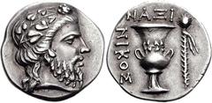 785684. Sold For $8750 CYCLADES, Naxos. Late 3rd-mid 2nd century BC. AR Didrachm (23mm, 7.77 g, 1h). Nikos, magistrate. Head of Dionysos right, wearing ivy wreath / Garlanded crater; NIKOΣ to left, fi