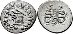 LYDIA, Tralles. Circa 128-85 BC. AR Cistophoric Tetradrachm (12.11 gm). Estimate $200 LYDIA, Tralles. Circa 128-85 BC. AR Cistophoric Tetradrachm (12.11 gm). Cista mystica with serpent; all within ivy