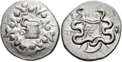 LYDIA, Tralles. Circa 128-85 BC. AR Cistophoric Tetradrachm (12.61 gm). Estimate $200 LYDIA, Tralles. Circa 128-85 BC. AR Cistophoric Tetradrachm (12.61 gm). Cista mystica with serpent; all within ivy