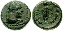LYDIA, Sardes. Circa 2nd-1st Century BC. Æ 15mm (5.85 gm). Laureate head of Herakles right, lion's skin around neck / Apollo standing facing, control marks to left, all within wreath. SNG Copenhagen 4