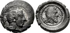 DYNASTS of LYCIA. Kherei. Circa 410-390 BC. AR Twelfth Stater – Obol (9mm, 0.59 g, 6h). Uncertain mint. Head of Athena right, wearing crested Attic helmet / Bearded head right, wearing kyrbasia; monog