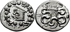LYDIA, Tralles. Circa 128-85 BC. AR Cistophoric Tetradrachm (12.66 gm). Estimate $200 LYDIA, Tralles. Circa 128-85 BC. AR Cistophoric Tetradrachm (12.66 gm). Cista mystica with serpent, all within ivy