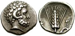 LUCANIA, Metapontion. Circa 325-275 BC. AR Diobol (1.09 gm). Estimate $1500 LUCANIA, Metapontion. Circa 325-275 BC. AR Diobol (1.09 gm). Laureate head of Zeus Ammon right / [ME] left, ear of barley wi
