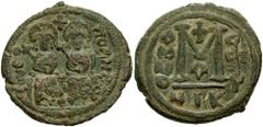 ARAB-BYZANTINE. In the style of Justin II. After 641 AD. Æ Follis (12.02 gm). Scythopolis (Beth Shan) mint. Estimate $750 ARAB-BYZANTINE. In the style of Justin II. After 641 AD. Æ Follis (12.02 gm). 