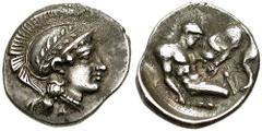 CALABRIA, Tarentum. Circa 280-228 BC. AR Diobol (1.09 gm). Estimate $500 CALABRIA, Tarentum. Circa 280-228 BC. AR Diobol (1.09 gm). Helmeted head of Athena right, helmet decorated with laurel wreath /