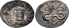 LYDIA, Tralleis. Circa 166-67 BC. AR Tetradrachm (30mm, 12.70 g, 1h). Cistophoric type. Cista mystica with serpent; all within ivy wreath / Two serpents entwined around bow and bowcase; upright thunde