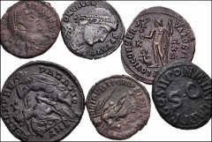 ROMAN. Imperial. Lot of twelve (12) bronze coins from Claudius to Valens. Includes: Claudius. Æ Quadrans // Licinius I. Æ Follis // Constantine I. Æ Follis // Crispus. Æ Follis (2) // Constantius II. 