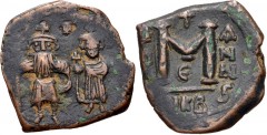 Heraclius, with Heraclius Constantine. 610-641. Æ Follis (20mm, 3.95 g, 6h). Nicomedia mint, 2nd officina. Dated IY(?) 6 (632/3). Heraclius, on left, holding long cross, and Heraclius Constantine, on 