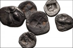 GREEK. Asia Minor. Lot of six (6) AR fractions, mostly from Ephesos in Ionia. Includes: Ephesos. Obol (2) // Same. Hemiobol (3). Lot also includes a hemiobol of Kolophon. Good to Good Fine. LOT SOLD A