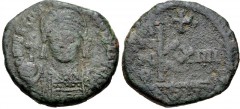 Justinian I. 527-565. Æ Half Follis (23mm, 8.56 g, 6h). Uncertain mint . Dated RY 14 (540/1). Helmeted and cuirassed bust facing, holding globus cruciger and shield / Large K; cross above, A/N/N/O XII