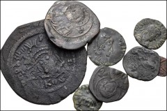 MIXED. Roman Imperial-Byzantine. Lot of eight (8) bronze coins. Includes: ROMAN IMPERIAL: Honorius // Valentinian III // Leo I // Uncertain late emperor. Contemporary imitation // BYZANTINE. Maurice T