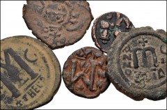 BYZANTINE. Lot of five (5) bronze coins from Justinian I to Constans II. Includes: Justinian I. Æ Follis // Justin II. Æ Half Follis // Tiberius II Constantine. Æ Follis // Constans II. Æ Follis (2). 