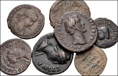ROMAN. Imperial. Lot of seven (7) bronze coins from Antoninus Pius to Constantius II. Includes: Antoninus Pius. Æ As // Faustina Senior. Æ As // Postumus. Æ Sestertius // Maximianus. Antoninianus // G