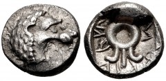 DYNASTS of LYCIA. Uncertain dynast. Circa 4th century BC. AR Hemiobol (7mm, 0.35 g). Head of a lion right, lacking a lower jaw / Uncertain symbol, possibly a diadem; uncertain Lycian inscription aroun