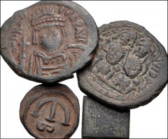 BYZANTINE. Lot of four (4) bronze pieces. Includes: Justinian I. Æ Pentanummium. SB 170 // Justin II, with Sophia. Æ Follis. SB 369 // Heraclius. Æ Follis. SB 839 // Coin weight. Cf. Bendall 103-4. VF