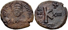 Justinian I. 527-565. Æ Half Follis (25mm, 10.13 g, 6h). Uncertain mint . Dated RY 14 (540/1). Helmeted and cuirassed bust facing, holding globus cruciger and shield / Large K; cross above, date acros