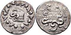LYDIA, Tralleis. Circa 166-67 BC. AR Tetradrachm (26mm, 12.55 g, 12h). Cistophoric type. Cista mystica with serpent within ivy wreath / Two serpents entwined around bow and quiver; ΑΠΟΛ above, TRAΛ to