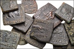 ORIENTAL GREEK–CENTRAL ASIAN. Lot of thirteen (13) bronze coins. Includes: Indo-Greek (Baktrian) [9] // Indo-Skythian [4]. Diameters from 17 to 25mm. Fine or slightly better, smoothing/cleaning scratc