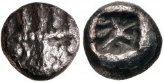 ASIA MINOR, Uncertain. Circa 500 BC. AR Diobol (9mm, 1.28 g). Stylized facing lion’s head wearing five-spiked crown / Incuse square punch with intersecting lines and pellet. Cf. M. Thompson, “Some Not