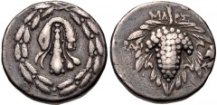 LYDIA, Tralleis. Circa 166-67 BC. AR Didrachm (19mm, 6.20 g, 11h). Cistophoric type. Mars–, magistrate. Struck circa 128-85 BC. Lion skin draped over upright club within wreath / Grape bunch on leaf; 