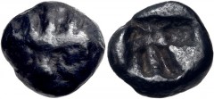 ASIA MINOR, Uncertain. 5th century BC. AR Obol (7mm, 0.65 g). Stylized facing lion’s head wearing four-spiked crown / Incuse square punch with intersecting lines and pellet. Cf. M. Thompson, “Some Not