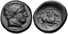 KINGS of MACEDON. Philip II. 359-336 BC. Æ Unit (17mm, 5.81 g, 11h). Uncertain mint in Macedon. Diademed head of Apollo right / Philip on horseback right; spearhead below. SNG ANS 850–1. Good VF, dark