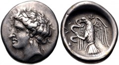 EUBOIA, Chalkis. Circa 338-308 BC. AR Drachm (15.5mm, 3.74 g, 12h). Head of Chalkis left / Eagle flying upward, head left, clutching serpent; flower to lower left. Picard Em. 2, dies 7/a (unlisted com