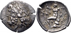 ARKADIA, Megalopolis. Circa 80-50 BC. AR Triobol – Hemidrachm (18mm, 2.38 g, 11h). Laureate head of Zeus left / Pan seated left on rock, raising hand and holding logobolon; above knee, eagle flying le