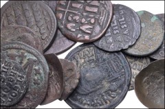 BYZANTINE. Lot of sixteen (16) mixed Æ denominations. Includes: A good mix of emperors and types, mostly folles, with a particular concentration on the 9th-10th centuries. Fine–Near VF. LOT SOLD AS IS