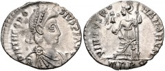 Theodosius I. AD 379-395. AR Siliqua (18mm, 1.46 g, 12h). Treveri (Trier) mint. Struck AD 388-395. Pearl-diademed, draped, and cuirassed bust right / Roma seated left on cuirass, holding Victory on gl