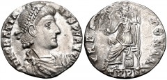 Gratian. AD 367-383. AR Siliqua (16mm, 1.69 g, 6h). Treveri (Trier) mint. Struck AD 375-378. Pearl-diademed, draped, and cuirassed bust right / Roma seated left on cuirass, holding crowning Victory on