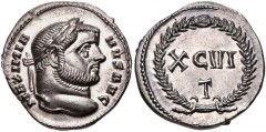 Maximianus. First reign, AD 286-305. AR Argenteus (18mm, 3.34 g, 6h). Ticinum mint. Struck circa AD 300. Laureate head right / XCVI / T in two lines within wreath. RIC VI 20b; Jeločnik –; RSC 69. Supe