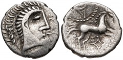 CELTIC, Iceni. Uninscribed. Circa 65-1 BC. AR Unit (13mm, 1.25 g, 3h). Norfolk God/Small Head (Normal Face-Horse A) type. Celticized head right; two trefoils before / Horse right; pellet below tail, w