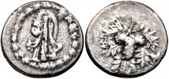 LYDIA, Tralleis. Circa 166-67 BC. AR Didrachm (21mm, 5.81 g, 12h). Cistophoric series. Lion’s skin draped over club; all within ivy wreath / Grape bunch on vine; [T]PAΛ to left; to right, uncertain sy