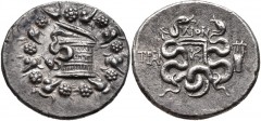 LYDIA, Tralleis. Circa 166-67 BC. AR Tetradrachm (27mm, 12.57 g, 12h). Cistophoric type. Dion, magistrate. Cista mystica with serpent within ivy wreath / Two serpents entwined around bow and quiver; ∆