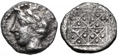 MACEDON, Chalkidian League. Circa 425-390 BC. AR Obol (7mm, 0.28 g). Reduced standard. Olynthos mint. Laureate head of Apollo left / Quadripartite incuse square, each quadrant diagonally divided into 