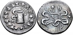 LYDIA, Tralleis. Circa 166-67 BC. AR Tetradrachm (27mm, 12.46 g, 12h). Struck circa 155-145 BC. Cista mystica with serpent; all within ivy wreath / Bowcase with serpents; to left, TPAΛ; to right, drap