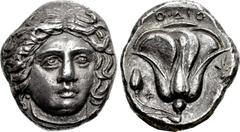 ISLANDS off CARIA, Rhodos. Rhodes . Circa 404-385 BC. AR Tetradrachm (21.5mm, 14.70 g, 12h). Head of Helios facing slightly right / Rose in profile, bud to left; POΔION above; Φ to left, floral motif 