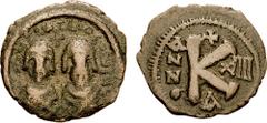REVOLT of the HERACLII. 608-610 AD. Æ Half Follis (4.38 gm, 1h). Alexandretta in Syria mint. Dated IY 14 (610 AD). Estimate $300 REVOLT of the HERACLII. 608-610 AD. Æ Half Follis (4.38 gm, 1h). Alexan